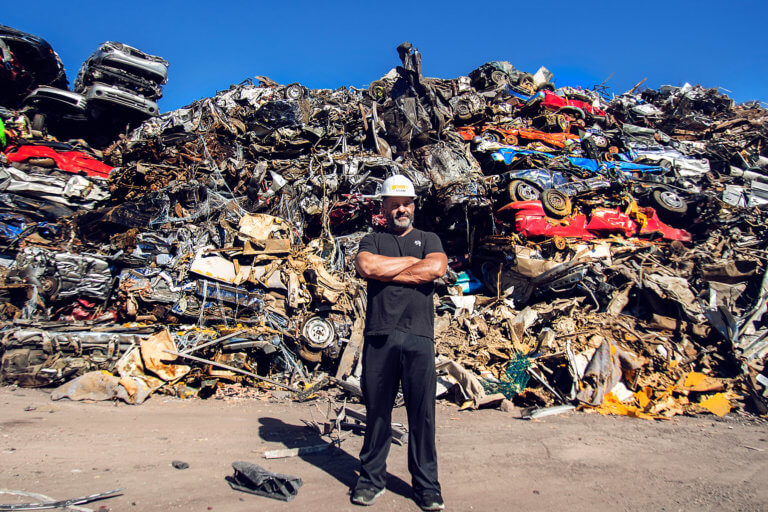 Adam Weitsman and load of cars to be recycled at Upstate Shredding