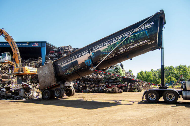 An Upstate Shredding tractor trailer loading recycled metal
